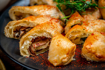 Homemade puff pastry with chicken and mushroom. Pie