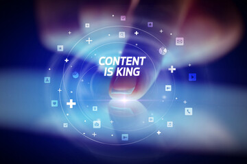 Finger touching tablet with social media icons concept