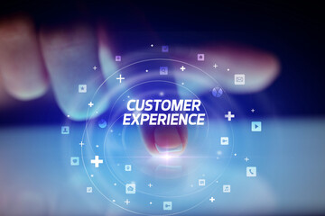 Finger touching tablet with social media icons concept