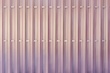 Colorful corrugated metal fence background.