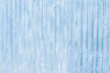 White corrugated metal fence background.