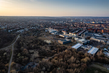 Obraz premium Drone view of buildings and a forest near Dresden