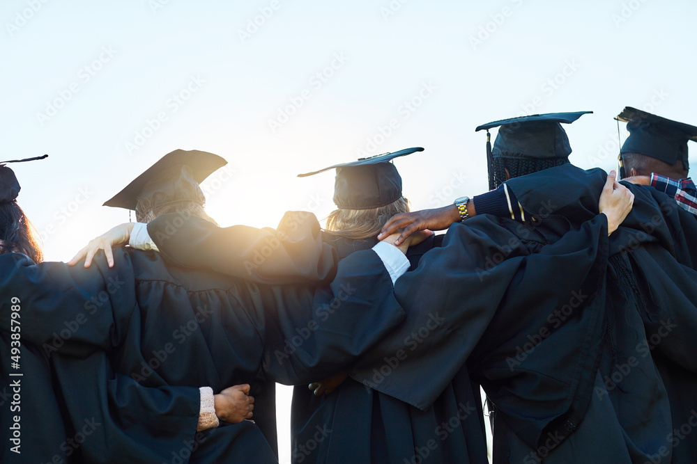 Aufkleber this is just the beginning. rearview shot of a group of students standing in a row on graduation day