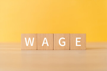 賃金のイメージ｜「WAGE」と書かれた積み木