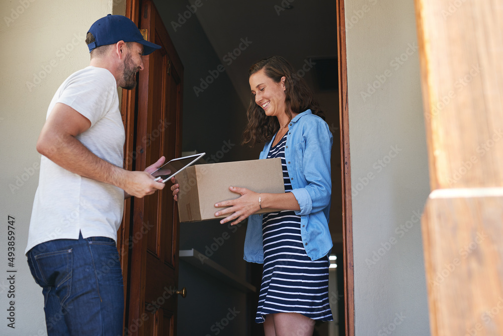 Poster youve made my day with this speedy delivery. shot of a courier making a delivery to a customer at he