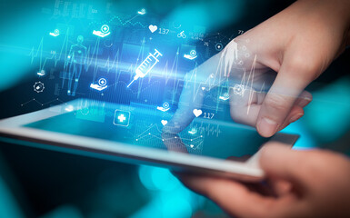 Close-up of a touchscreen with healthcare icons