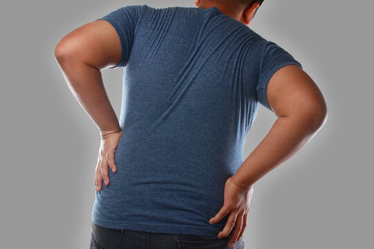 Obese Asian men with back and lumbar pain are at risk for intervertebral disc disease. Because the body has a lot of weight. concept of obesity and spinal disease. Clipping Path