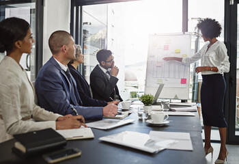 This was our best month. Shot of businesspeople in an office.