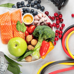 Foods for healthy heart on light background.