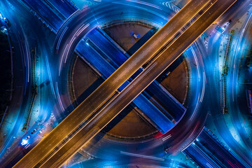 Aerial view of car traffic transportation above circle roundabout road of Drone aerial view fly ,...