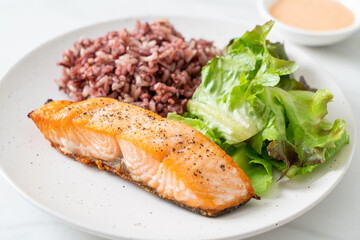 grilled salmon fillet steak with rice berry and vegetable