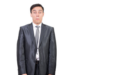 Shocked man in suit looking at camera