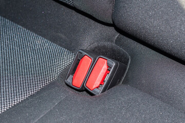 Seat belt buckle in the car.