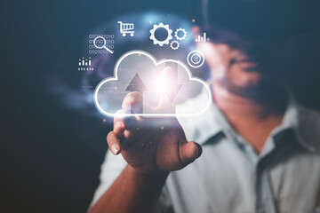 Concept metaverses. Man wears VR glasses and accesses Cloud Technology Internet Network data systems and databases through technology.
