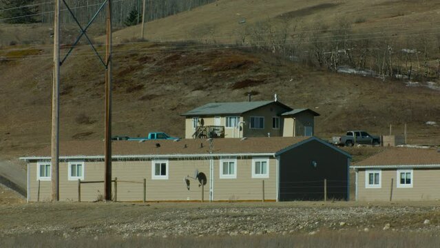 Affordable Housing In Rural Area Close Up Cars Parked