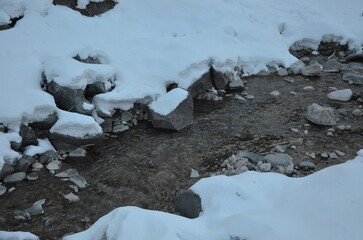 Photos of the snowcapped Dolomites during a winter trip and the small villages in the mountain valleys on a sunny, cold day