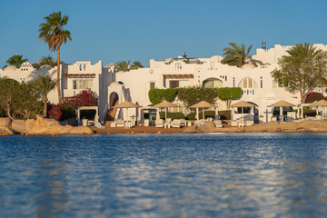 Calm beach on the red sea of Sharm El Sheikh during sunrise, Egypt