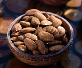 almonds in a wooden bowl