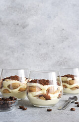 Italian dessert tiramisu in a glass.