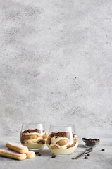 Italian dessert tiramisu in a glass.