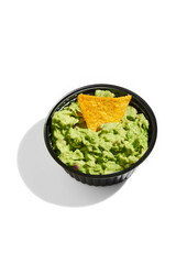 Mexican nachos with avocado guacamole on a white background. Hard Light