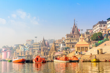Morning view at holy ghats of Varanasi, India - obrazy, fototapety, plakaty