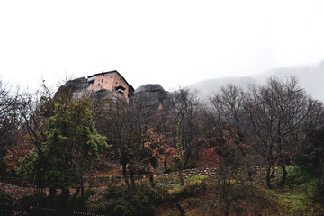 Monastery in the cloudly mountains