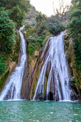 Fototapeta na wymiar Beautiful Kempty Waterfalls with turquoise waters in Mussoorie