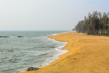 fishning boats at the rocky beach of Someshwar, Mangalore, Karnataka, India	