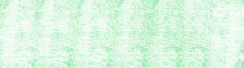 Bright pastel green colored painted paper texture background template pattern, long panoramic banner.