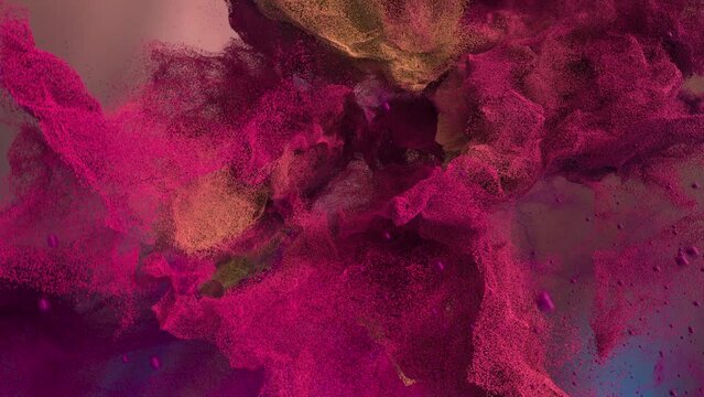 Abstract loop animation of full colored particles that form a galactic nebula