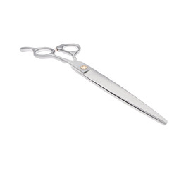 Scissors for cutting people and pets. Grooming scissors. Closed scissors on a white isolated background. Angle view.