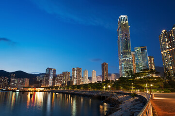 Fototapeta na wymiar midtown and harbor of Hong Kong city at dusk