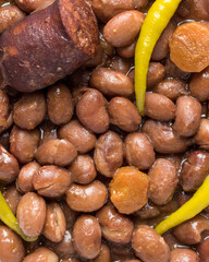 Beans recipe with chillies, black pudding and chorizo