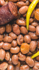 Beans recipe with chillies, black pudding and chorizo