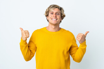English man over isolated white background with thumbs up gesture and smiling