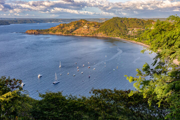 Obraz premium pacific ocean on Playa Poor Calzon Beach, El Coco Costa Rica. Picturesque paradise tropical landscape of Costa Rica beach. Pura Vida concept, travel to exotic tropical country.
