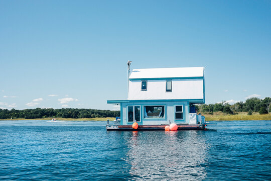 USA, Massachusetts, Gloucester, House Boat Floating On Annisquam River