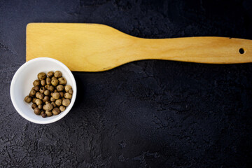Black peppercorn on bowl