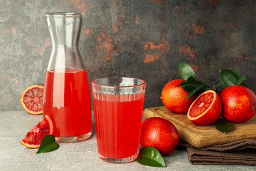 Concept of fresh drink with red orange juice