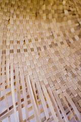 Part of a straw hat close-up. Braided headdress