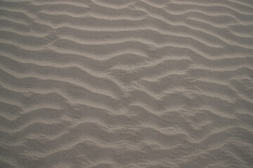 sand texture. wavy sand textured background. sand textured beach.