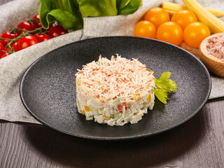 Russian traditional salad with crab
