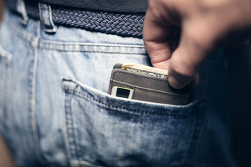 Pickpocket stealing wallet from back jean pocket