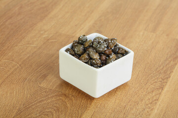 Salted marinated capers snack appetiser