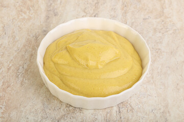 Organic mustard sauce in the bowl