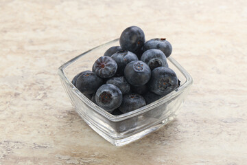 Sweet ripe blueberry heap in the bowl