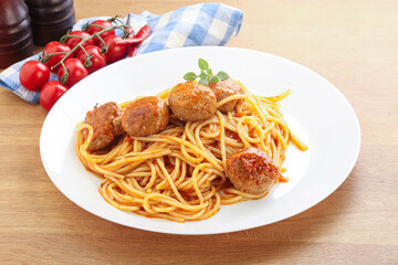 Spaghetti with meatball in tomato sause