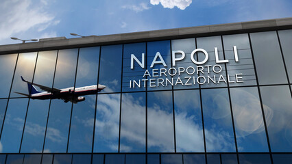 Airplane landing at Napoli, Naples Italy airport mirrored in terminal