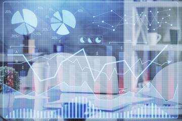 Double exposure of stock market graph drawing and office interior background. Concept of financial analysis.
